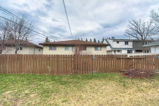Photo 2: 11205/11207 11 Street SW in Calgary: Southwood Full Duplex for sale : MLS®# A2126343