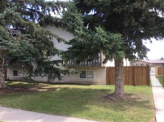 Photo 1: 5723-5725 54 Street: Rocky Mountain House 4 plex for sale : MLS®# A2074822