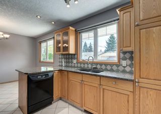 Photo 8: 128 Queensland Place SE in Calgary: Queensland Detached for sale : MLS®# A1224303