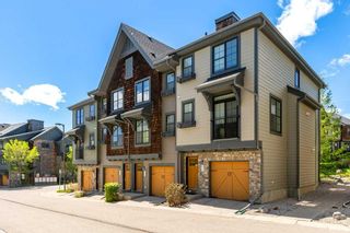 Main Photo: 213 Ascot Circle SW in Calgary: Aspen Woods Row/Townhouse for sale : MLS®# A2128751