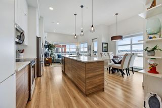 Photo 2: 412 19661 40 Street SE in Calgary: Seton Apartment for sale : MLS®# A2019109