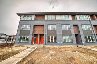 Photo 1: 330 Lucas Avenue NW in Calgary: Livingston Row/Townhouse for sale : MLS®# A2130679