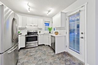 Photo 14: 167 BRIDLEWOOD CM SW in Calgary: Bridlewood House for sale