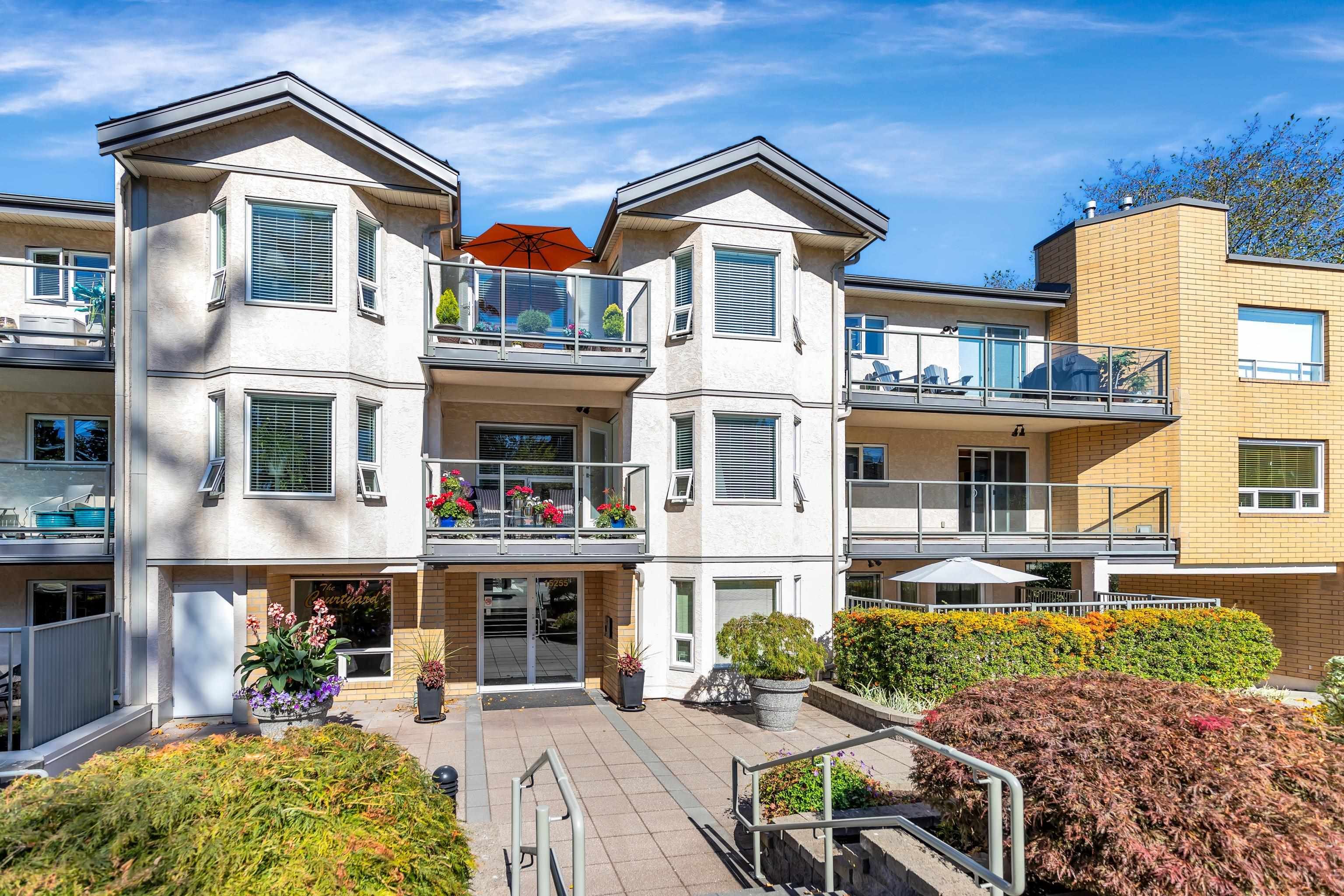 Main Photo: 209 15255 18 Avenue in Surrey: King George Corridor Condo for sale in "THE COURTYARD" (South Surrey White Rock)  : MLS®# R2725472