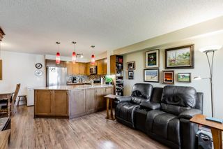 Photo 12: 7403 304 Mackenzie Way SW: Airdrie Apartment for sale : MLS®# A1251468