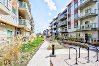Photo 1: 403 200 Harvest Hills Place NE in Calgary: Harvest Hills Apartment for sale : MLS®# A2130932