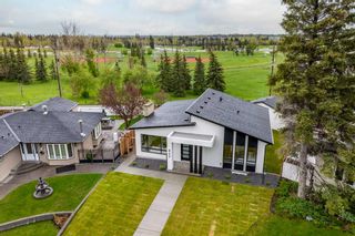 Main Photo: 407 Wilkinson Place SE in Calgary: Willow Park Detached for sale : MLS®# A2134165