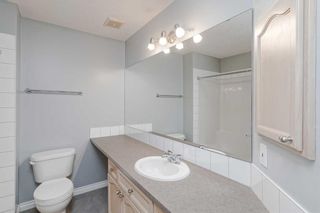 Photo 12: 21 Crystal Shores Cove: Okotoks Row/Townhouse for sale : MLS®# A2126777