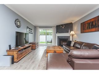 Photo 4: 136 5641 201 Street in Langley: Langley City Townhouse for sale in "The Huntington" : MLS®# R2409027