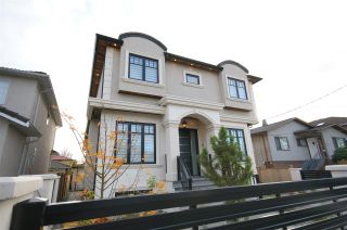 Photo 1: 2136 E 34TH Avenue in Vancouver: Victoria VE House for sale in "Victoria" (Vancouver East)  : MLS®# R2219667