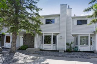 Photo 1: 312 Riverglen Drive SE in Calgary: Riverbend Row/Townhouse for sale : MLS®# A1232279