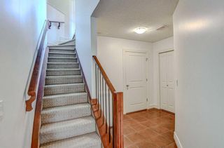 Photo 34: 4 156 Rockyledge View NW in Calgary: Rocky Ridge Row/Townhouse for sale : MLS®# A2120202