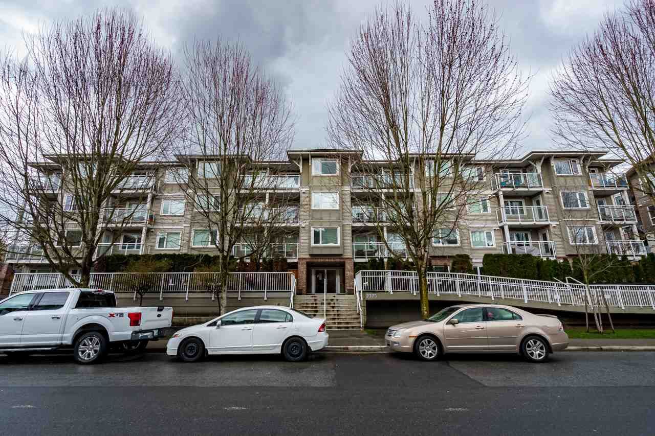 Main Photo: 111 2373 ATKINS Avenue in Port Coquitlam: Central Pt Coquitlam Condo for sale in "THE CARMANDY" : MLS®# R2554819