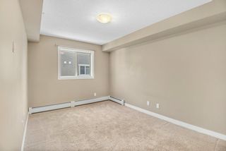 Photo 16: 9404 403 Mackenzie Way SW: Airdrie Apartment for sale : MLS®# A2010407