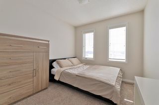 Photo 27: 104 Windstone Link SW: Airdrie Row/Townhouse for sale : MLS®# A1190179