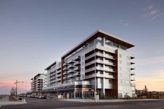 Photo 2: 401 8445 Broadcast Avenue SW in Calgary: West Springs Apartment for sale : MLS®# A2115322