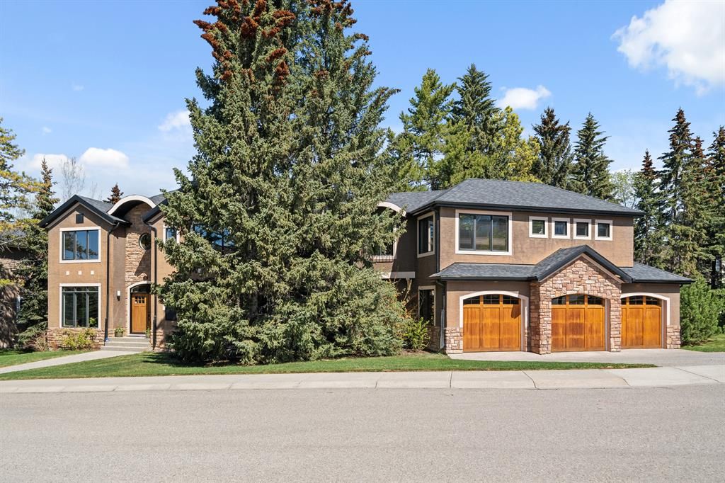 Main Photo: 12 Spring Willow Place SW in Calgary: Springbank Hill Detached for sale : MLS®# A2046903