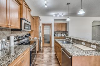 Photo 3: 6 Aspen Hills Manor SW in Calgary: Aspen Woods Detached for sale : MLS®# A1211374