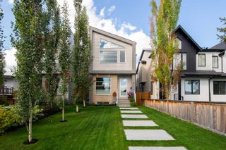 Photo 1: 2134 53 Avenue SW in Calgary: North Glenmore Park Detached for sale : MLS®# A2080035