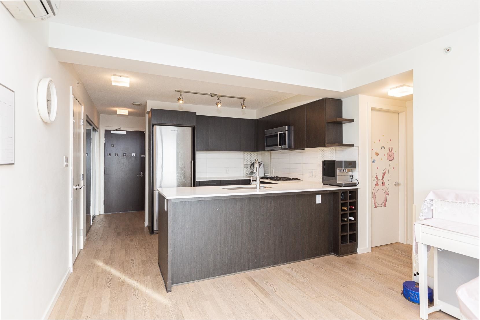 Main Photo: 1502 7888 ACKROYD Road in Richmond: Brighouse Condo for sale in "Quintet" : MLS®# R2748100