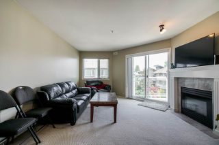Photo 4: 406 8142 120A Street in Surrey: Queen Mary Park Surrey Condo for sale in "Sterling Court" : MLS®# R2381590
