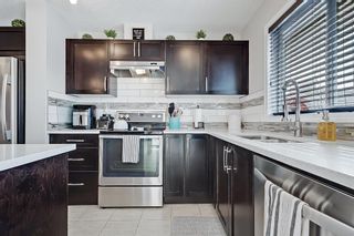 Photo 13: 58 Auburn Crest Place SE in Calgary: Auburn Bay Semi Detached (Half Duplex) for sale : MLS®# A2030014