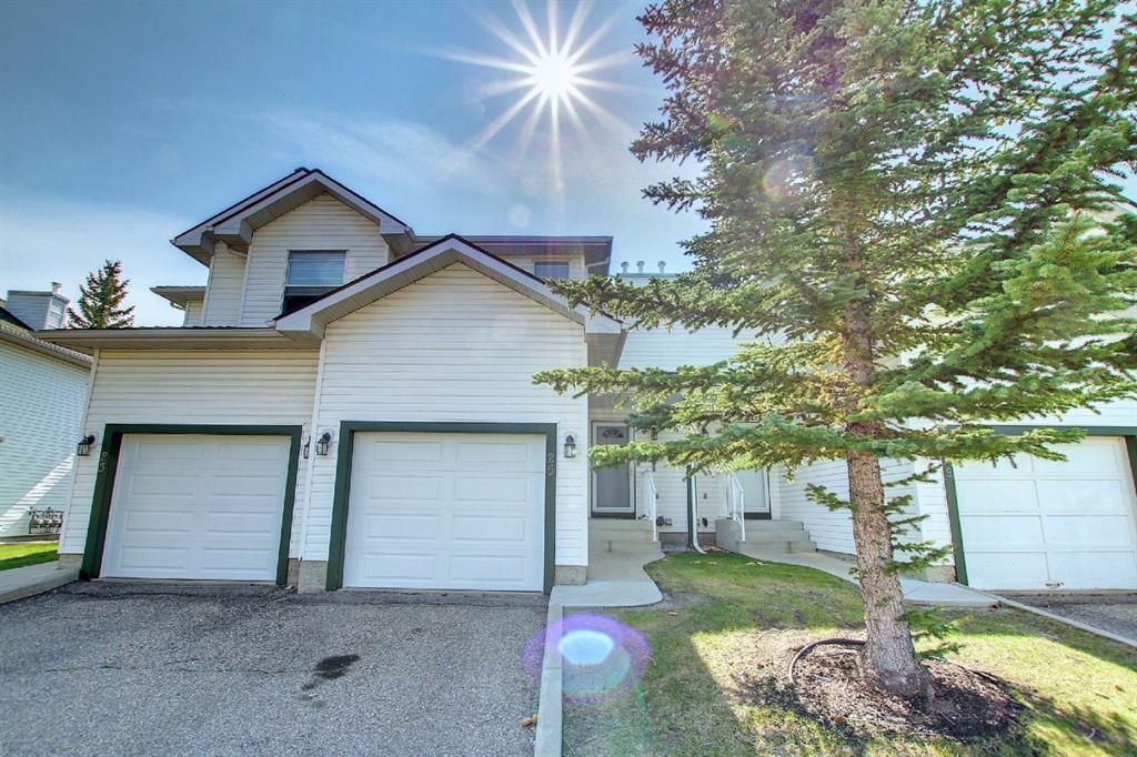 Photo 1: Photos: 25 Sandpiper Link NW in Calgary: Sandstone Valley Row/Townhouse for sale : MLS®# A1143178