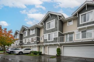 Photo 1: 55 20760 DUNCAN Way in Langley: Langley City Townhouse for sale in "WYNDHAM LANE" : MLS®# R2874981