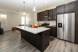 Photo 5: 731 Redstone Drive in Calgary: Redstone Semi Detached (Half Duplex) for sale : MLS®# A2125934