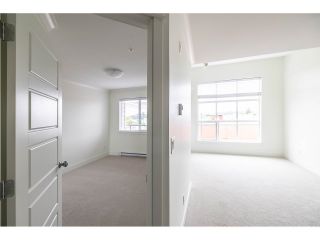 Photo 9: 412 30515 CARDINAL Avenue in Abbotsford: Abbotsford West Condo for sale in "Tamarind Westside" : MLS®# R2803481
