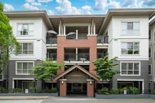 Photo 1: A210 8929 202 Street in Langley: Walnut Grove Condo for sale in "The Grove" : MLS®# R2781255