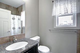 Photo 13: 115 Everhollow Street SW in Calgary: Evergreen Detached for sale : MLS®# A1145858