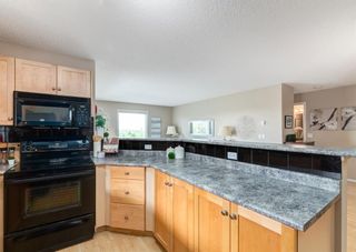 Photo 4: 2302 2518 Fish Creek Boulevard SW in Calgary: Evergreen Apartment for sale : MLS®# A1238116