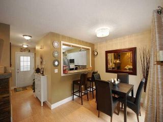 Photo 5: 38 2736 ATLIN Place in Coquitlam: Coquitlam East Townhouse for sale in "CEDAR GREEN ESTATES" : MLS®# V1137675