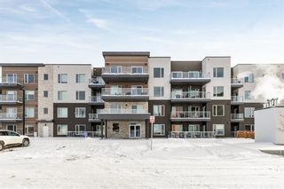 Photo 1: 205 150 shawnee Square SW in Calgary: Shawnee Slopes Apartment for sale : MLS®# A2022253
