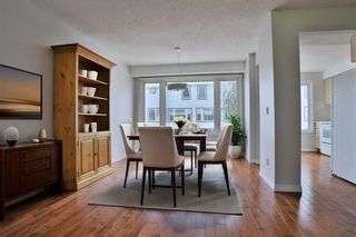 Photo 3: 205 Coachway Lane SW in Calgary: Coach Hill Row/Townhouse for sale : MLS®# A2142572