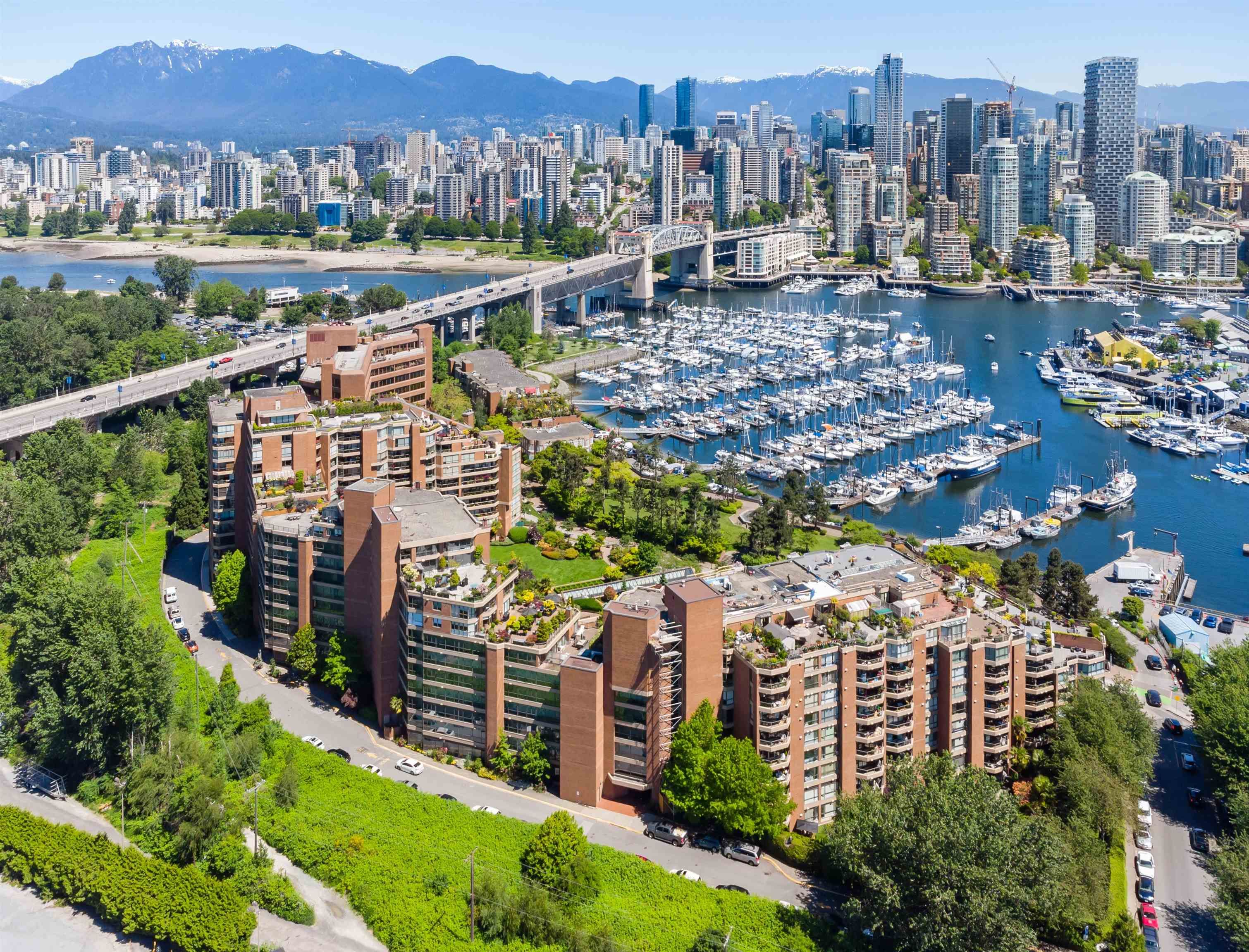 Main Photo: 209 1470 PENNYFARTHING Drive in Vancouver: False Creek Condo for sale in "Harbour Cove" (Vancouver West)  : MLS®# R2843462