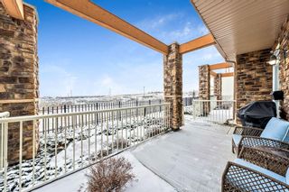 Photo 4: 4 145 Rockyledge View NW in Calgary: Rocky Ridge Row/Townhouse for sale : MLS®# A2018156