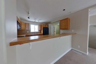 Photo 23: 98 313 Millennium Drive: Fort McMurray Row/Townhouse for sale : MLS®# A2102877