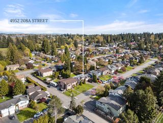 Photo 1: 4952 208A Street in Langley: Langley City House for sale : MLS®# R2871581