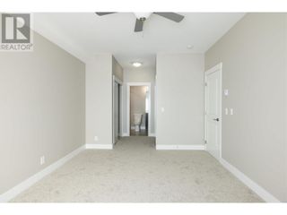 Photo 17: 1165 Sutherland Avenue Unit# 406 in Kelowna: House for sale : MLS®# 10312969