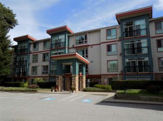 Photo 1: 205 33485 SOUTH FRASER Way in Abbotsford: Central Abbotsford Condo for sale in "CITADEL RIDGE" : MLS®# R2490166
