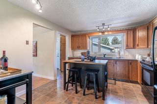 Photo 8: 63 Mckinley Way SE in Calgary: McKenzie Lake Detached for sale : MLS®# A2053056