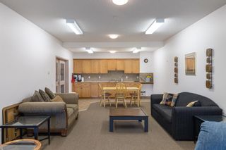 Photo 36: 319 248 Sunterra Ridge Place: Cochrane Apartment for sale : MLS®# A2004149