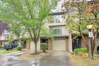 Photo 1: 3915 Point Mckay Road NW in Calgary: Point McKay Row/Townhouse for sale : MLS®# A2002885