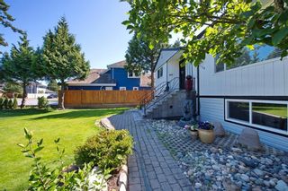 Photo 1: 4729 64 Street in Delta: Holly House for sale (Ladner)  : MLS®# R2746952