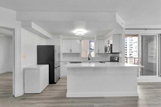 Photo 2: 401 683 10 Street SW in Calgary: Downtown West End Apartment for sale : MLS®# A2125608