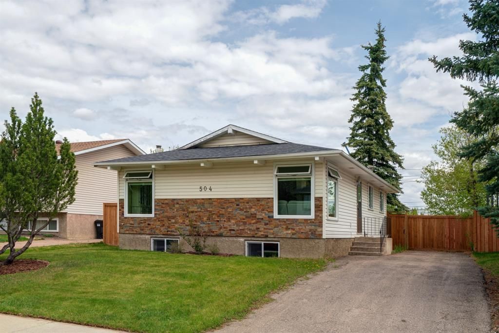 Main Photo: 504 Cantrell Drive SW in Calgary: Canyon Meadows Detached for sale : MLS®# A1220081