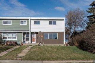 Main Photo: A 5416 53 Street: Camrose Row/Townhouse for sale : MLS®# A2127828