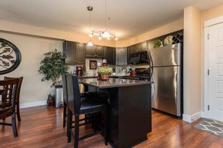 Photo 7: 110 30525 CARDINAL Avenue in Abbotsford: Abbotsford West Condo for sale in "Tamarind Westside" : MLS®# R2594552